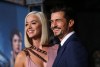 Katy Perry y Orlando Bloom posan durante una alfombra roja | Getty Images