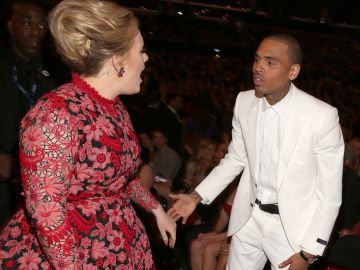 Adele y Chris Brown | Getty Images