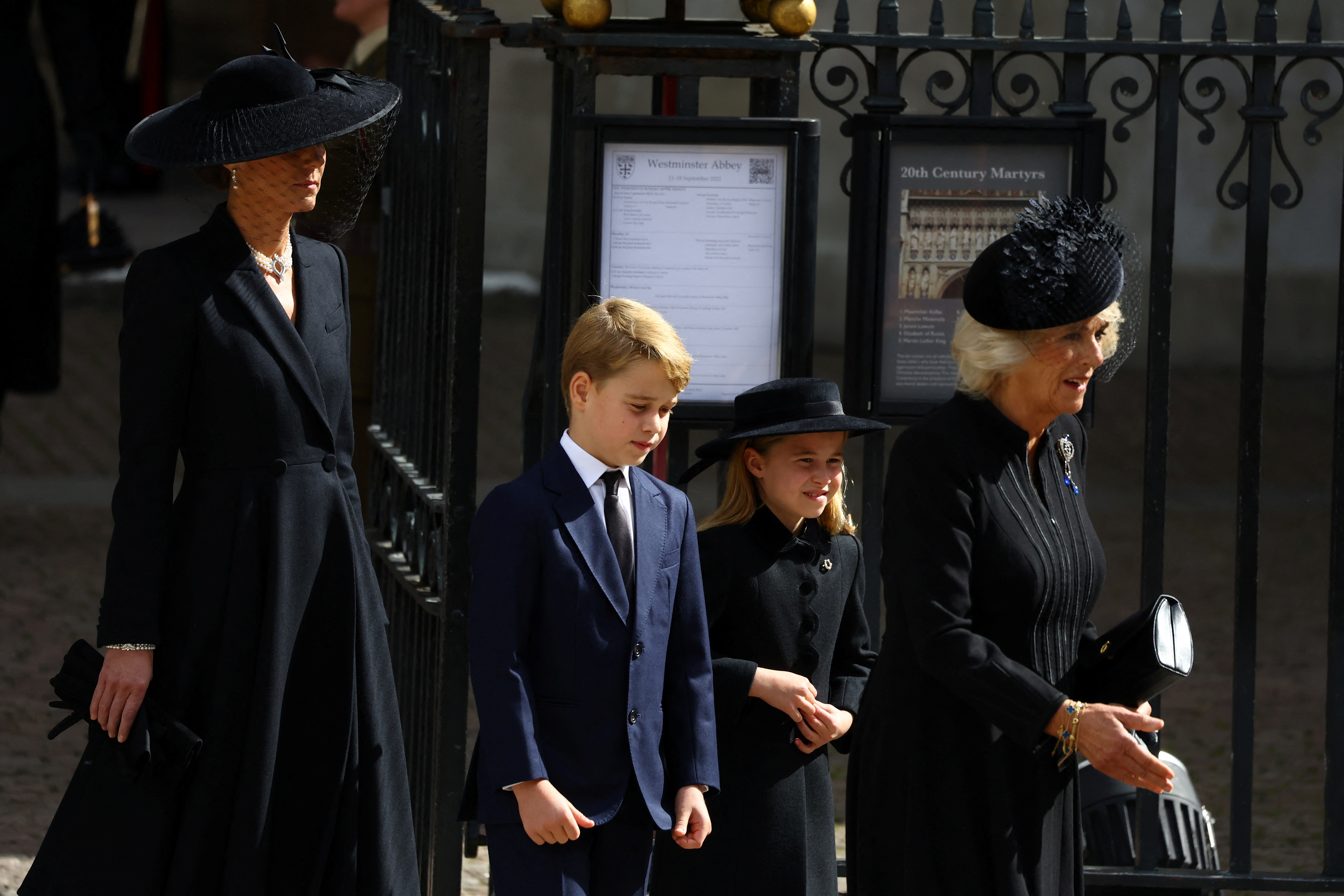 LONDON, ENGLAND - SEPTEMBER 19: Catherine, Princess of Wales, Prince George of Wales, Princess Charlotte of Wales and Camilla, Queen Consort leave Westminster Abbey after the State Funeral of Queen Elizabeth II on September 19, 2022 in London, England.  Elizabeth Alexandra Mary Windsor was born in Bruton Street, Mayfair, London on 21 April 1926. She married Prince Philip in 1947 and ascended the throne of the United Kingdom and Commonwealth on 6 February 1952 after the death of her Father, King George VI. Queen Elizabeth II died at Balmoral Castle in Scotland on September 8, 2022, and is succeeded by her eldest son, King Charles III. (Photo by Hannah McKay - WPA Pool/Getty Images)