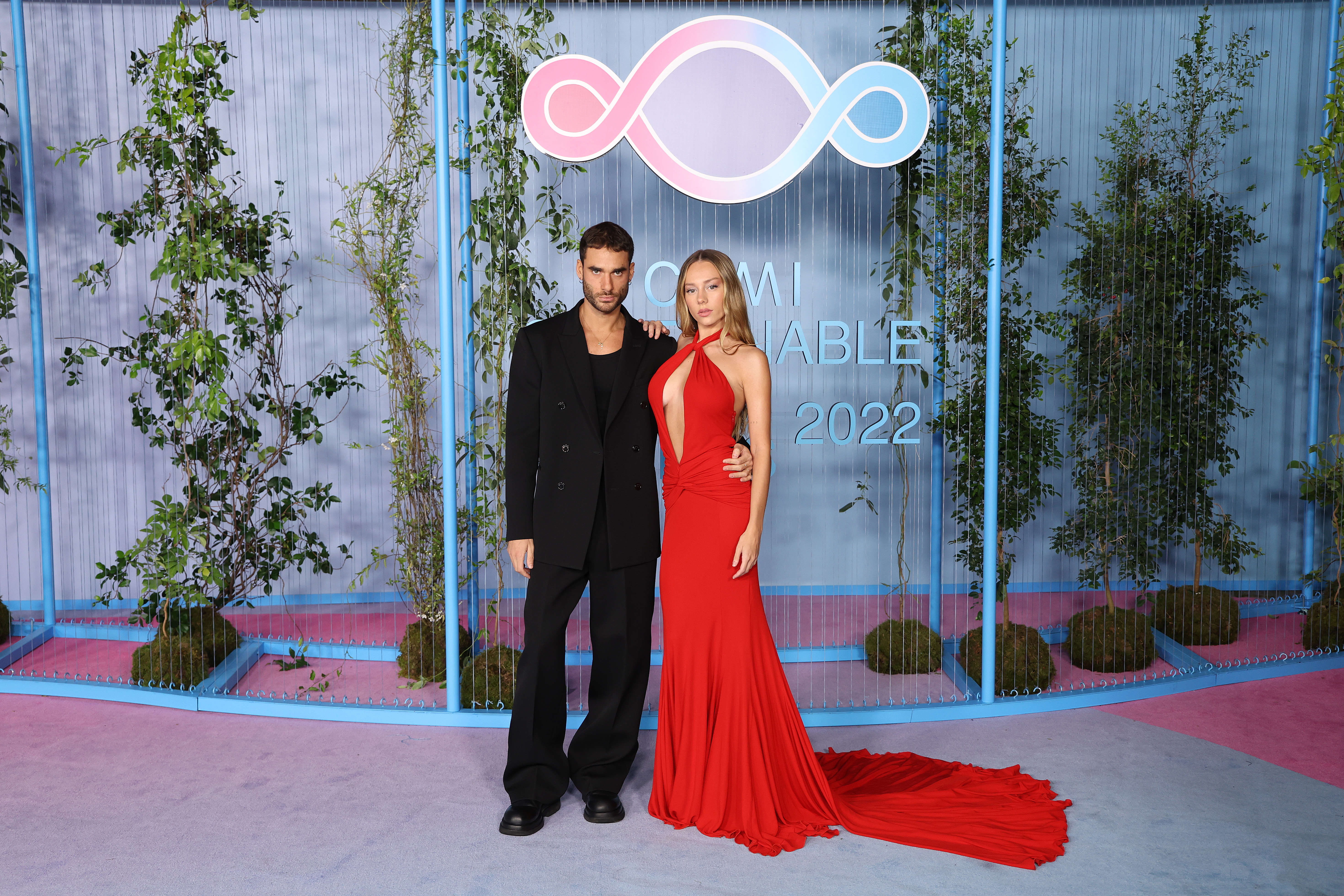 MILAN, ITALY - SEPTEMBER 25: Nicolas Furtado and Ester Exposito attend the CNMI Sustainable Fashion Awards 2022 pink carpet during the Milan Fashion Week Womenswear Spring/Summer 2023 on September 25, 2022 in Milan, Italy. (Photo by Vittorio Zunino Celotto/Getty Images)