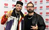 Nicky Jam junto a Enrique Santos.
