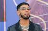 Anuel AA presume tatuaje de fan junto a Messi y Tupac
