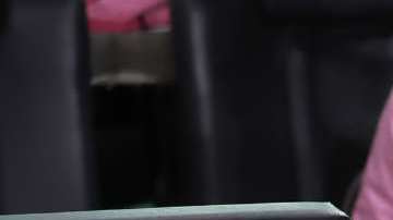 Anuel AA y su novia Laury Saavedra.