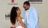 Natti Natasha y Raphy Pina asisten a los Premios Billboard de Música Latina 2021 en el Watsco Center el 23 de septiembre de 2021 en Coral Gables, Florida.