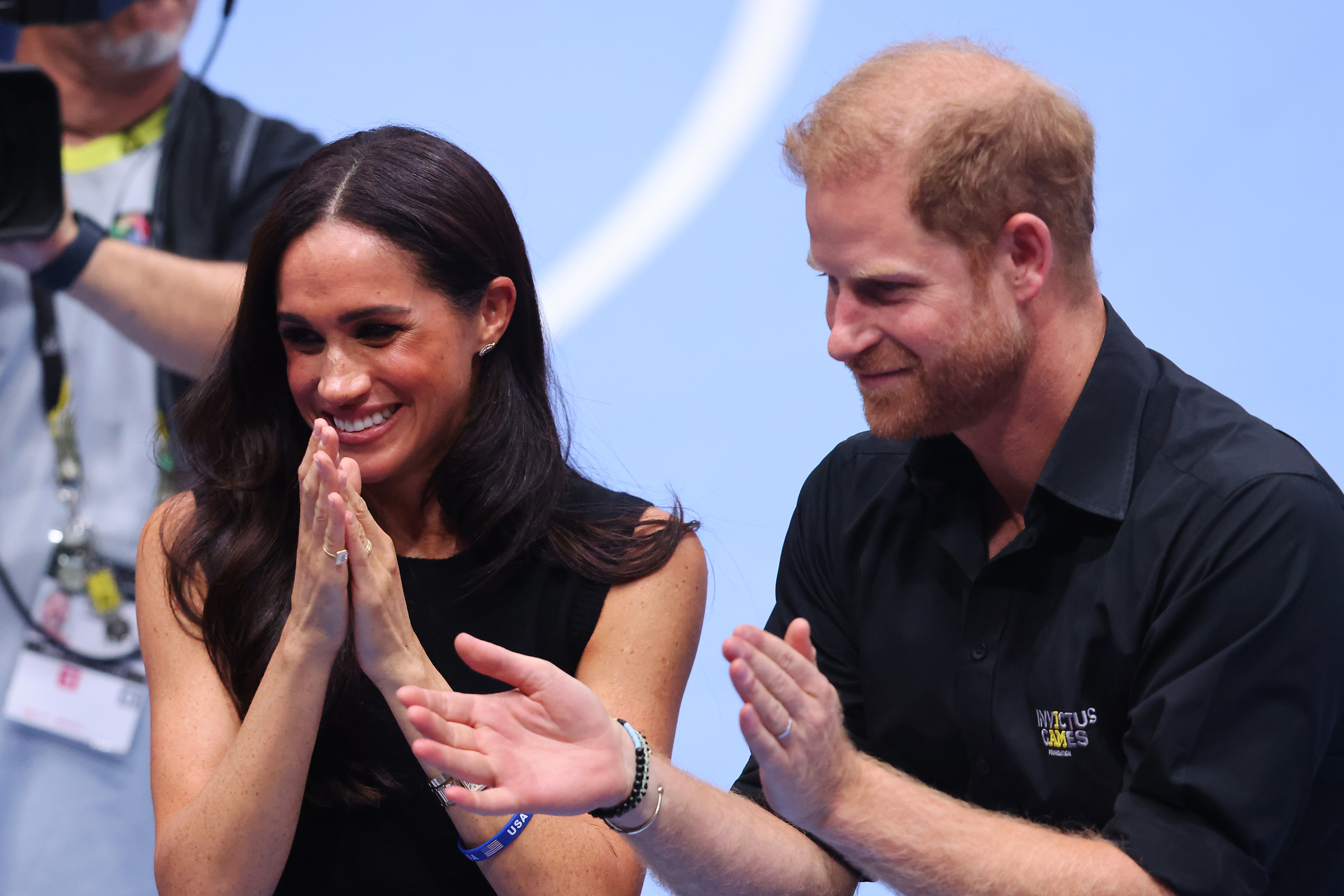 DUESSELDORF, GERMANY - SEPTEMBER 13: Prince Harry, Duke of Sussex and Meghan, Duchess of Sussex attend the Mixed Team Wheelchair Basketball Medal Ceremony during day four of the Invictus Games Düsseldorf 2023 on September 13, 2023 in Duesseldorf, Germany. (Photo by Joern Pollex/Getty Images for Invictus Games Düsseldorf 2023)