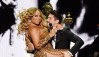 Mariah Carey y Bryan Tanaka actúan en concierto - Nueva York, Nueva York en el Madison Square Garden el 19 de agosto de 2017 en la ciudad de Nueva York.