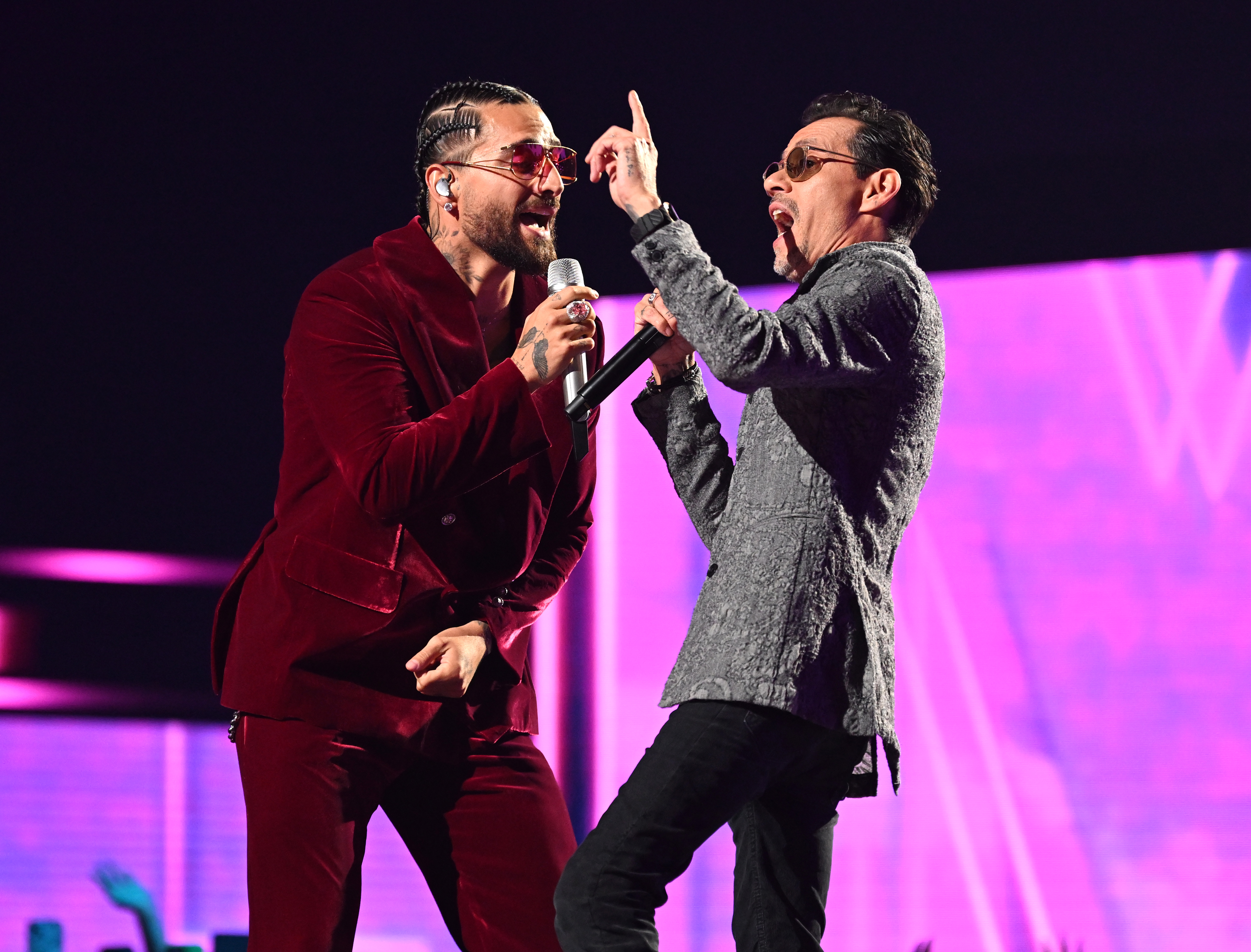 MIAMI, FLORIDA - FEBRUARY 23: Marc Anthony and Maluma perform onstage during the 35th Premio Lo Nuestro at Miami-Dade Arena on February 23, 2023 in Miami, Florida. (Photo by Jason Koerner/Getty Images)