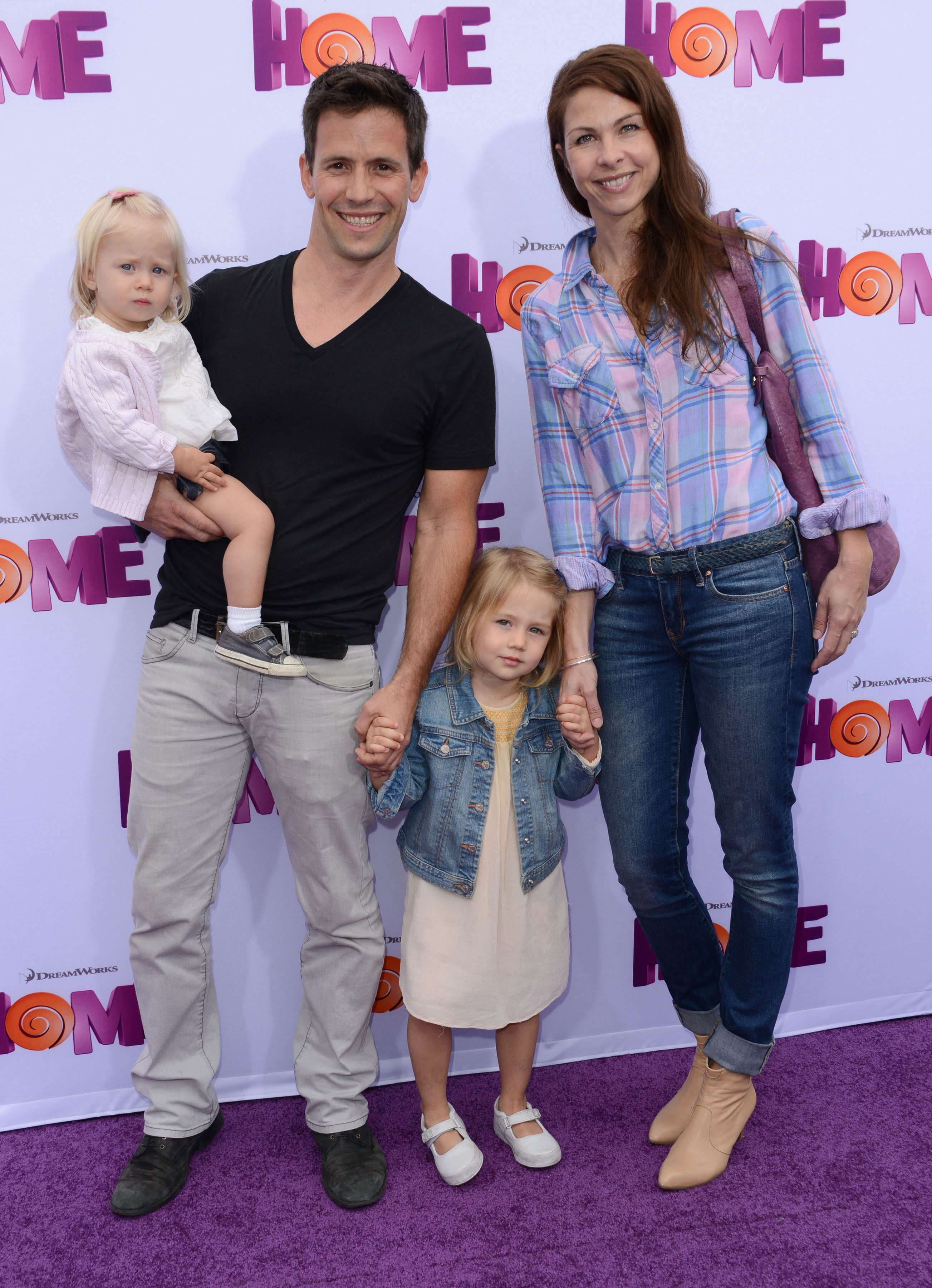 Actor Christian Oliver with his family arrives for the premiere of 'Home' at the Regency Village theatre in Westwood, California, March 22, 2015. German-born Hollywood actor Christian Oliver was killed along with his two young daughters as their small plane plummeted into the Caribbean Sea moments after takeoff, local police said January 5, 2024. (Photo by Chris DELMAS / AFP) (Photo by CHRIS DELMAS/AFP via Getty Images)