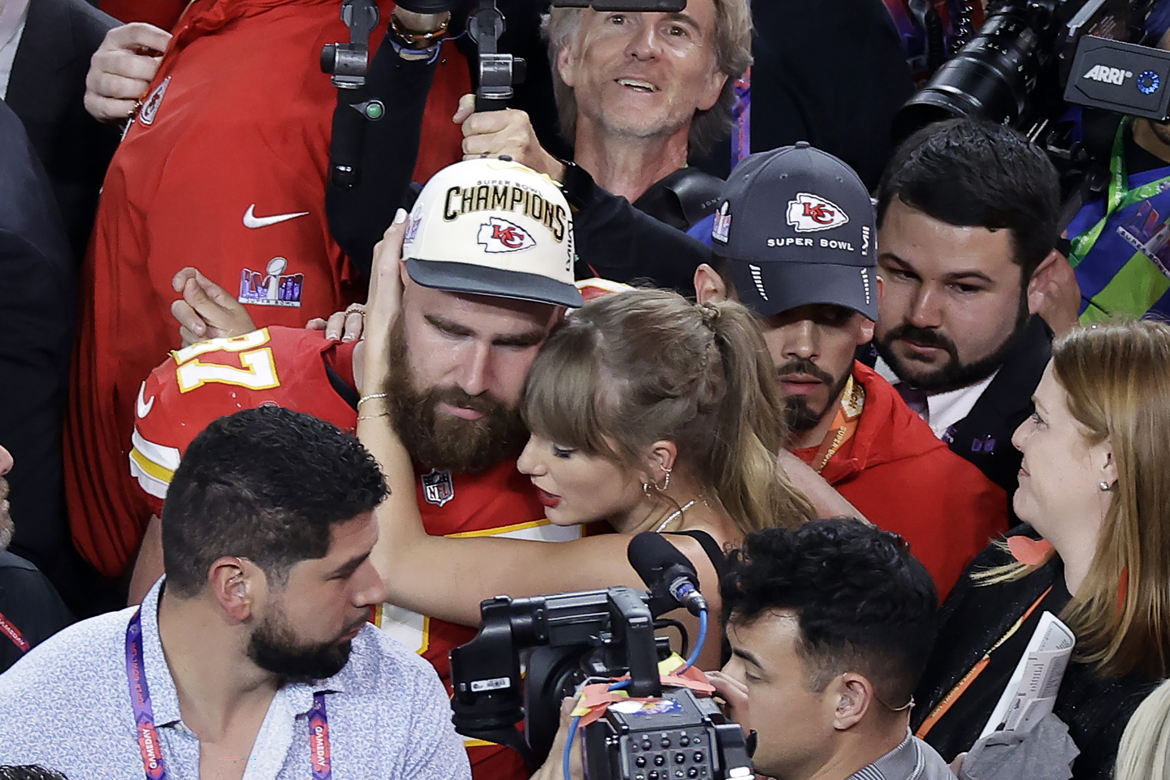 Kansas City Chiefs tight end Travis Kelce (87) is embraced by Taylor Swift after the Chiefs defeated the San Francisco 49ers during the NFL Super Bowl 58 football game Sunday, Feb. 11, 2024, in Las Vegas. The Chiefs won 25-22 against the 49ers. (AP Photo/Adam Hunger)