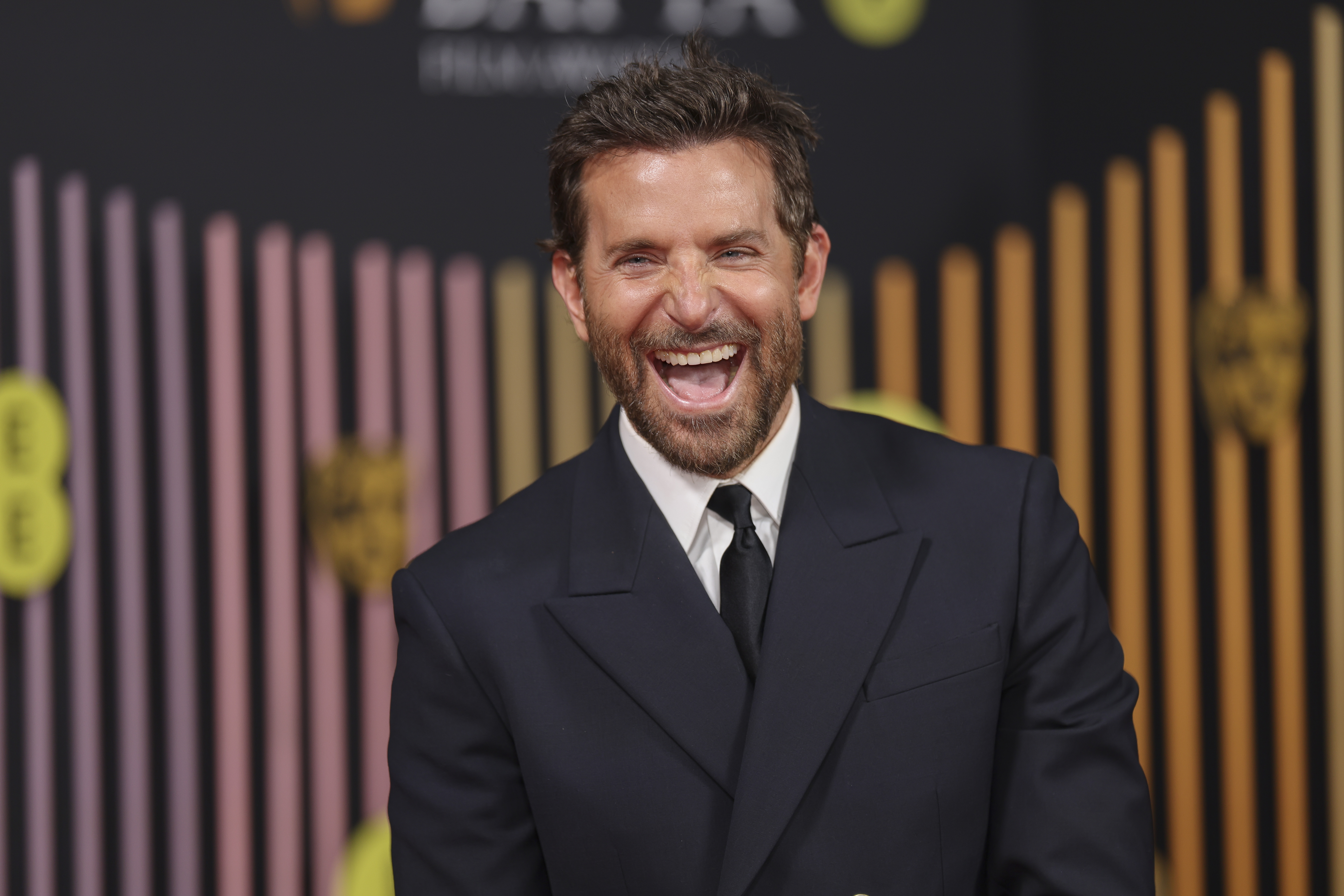 Bradley Cooper poses for photographers upon arrival at the 77th British Academy Film Awards, BAFTA's, in London, Sunday, Feb. 18, 2024. (Photo by Vianney Le Caer/Invision/AP)