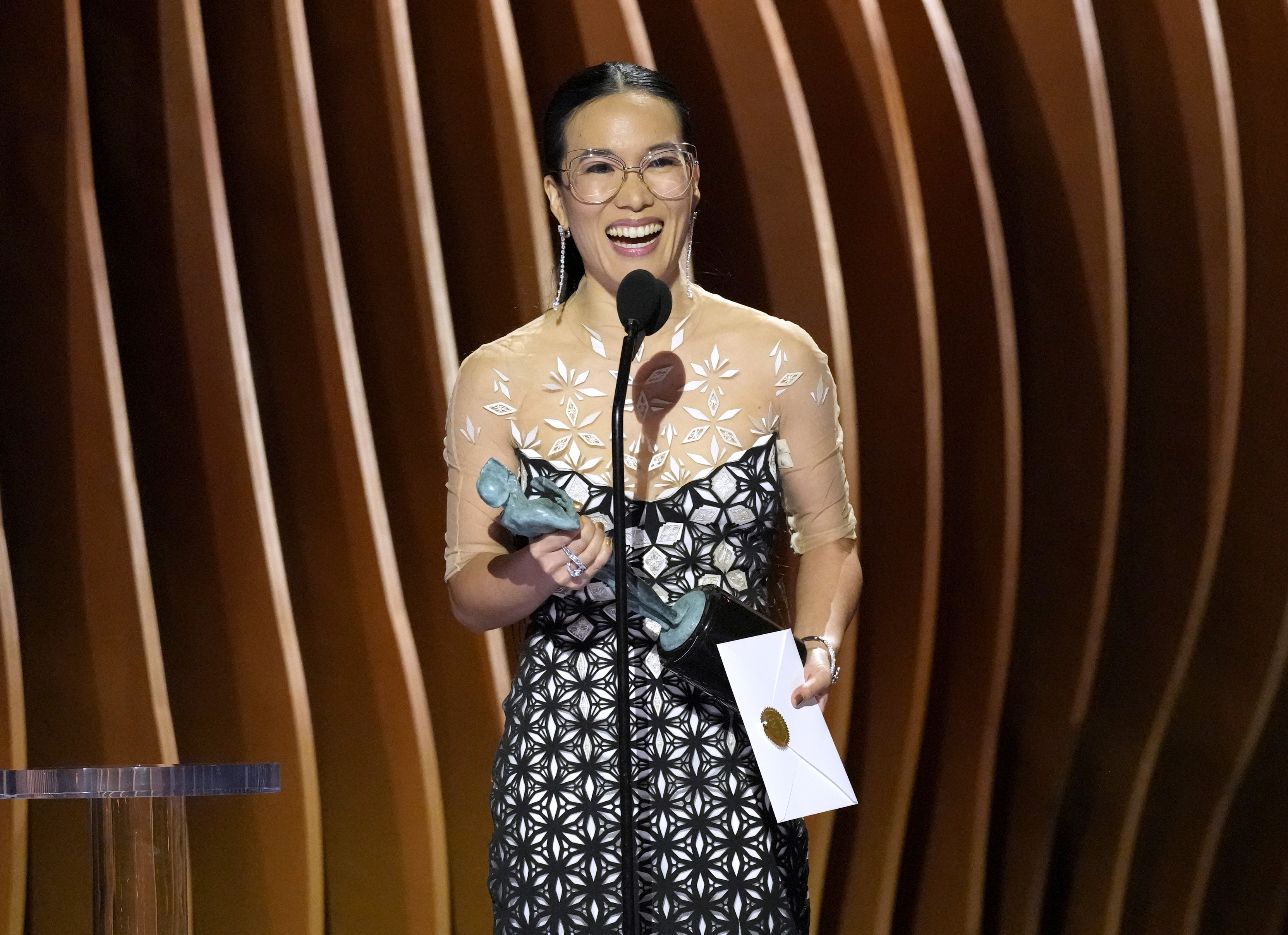 Ali Wong accepts the award for outstanding performance by a female actor in a television movie or limited series for "Beef" during the 30th annual Screen Actors Guild Awards on Saturday, Feb. 24, 2024, at the Shrine Auditorium in Los Angeles. (AP Photo/Chris Pizzello)