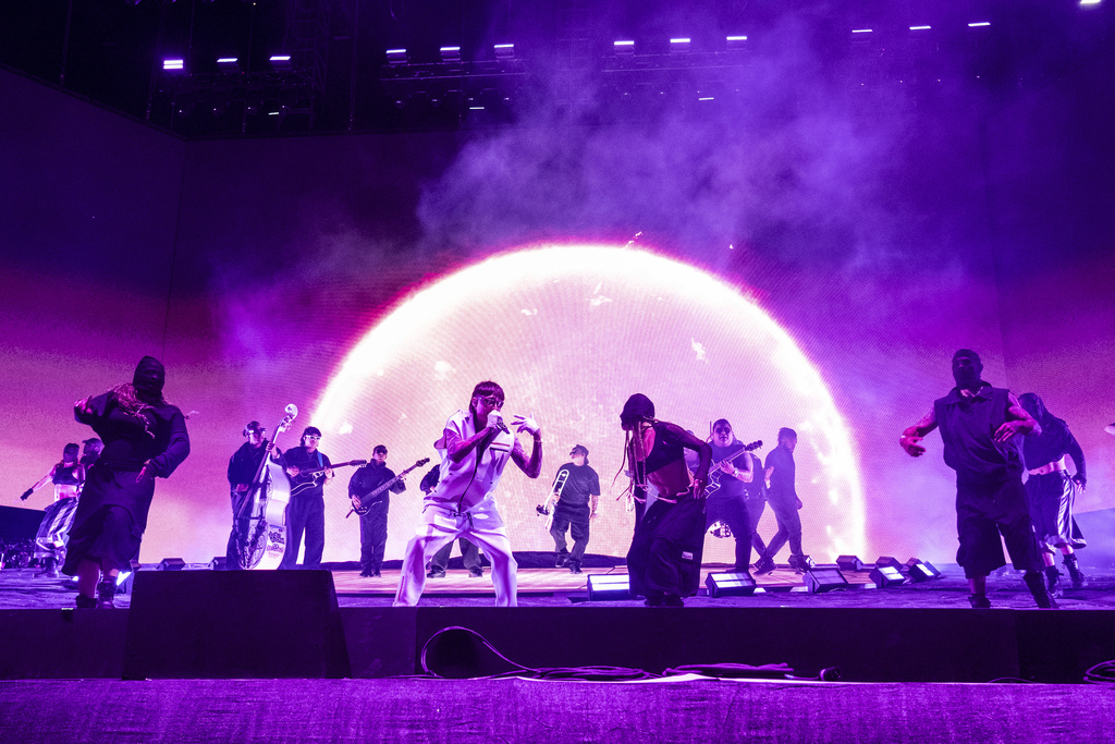 Peso Pluma performs during the the first weekend of the Coachella Valley Music and Arts Festival at Empire Polo Club on Friday, April 12, 2024, in Indio, Calif. (Photo by Amy Harris/Invision/AP)