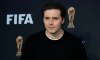 Brooklyn Beckham borró rastros de sus padres en sus tatuajes.